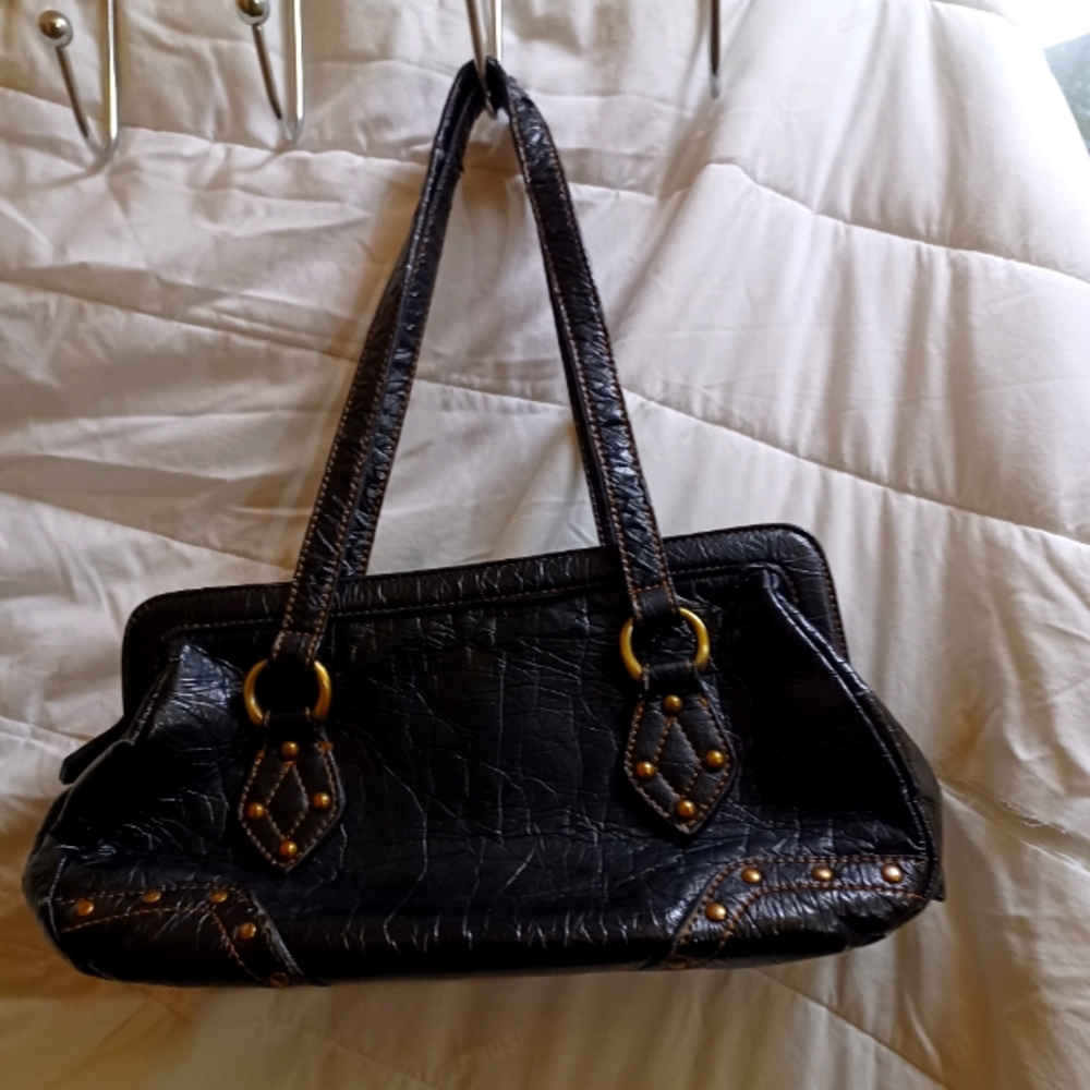 Black leather dress Bag in good condition, stylish